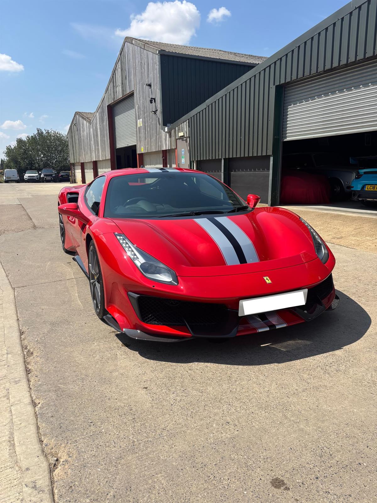 Red Ferrari 488 Pista after a single-stage machine polish